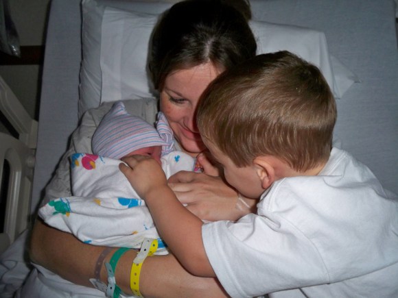 Big bro and little sis with mom